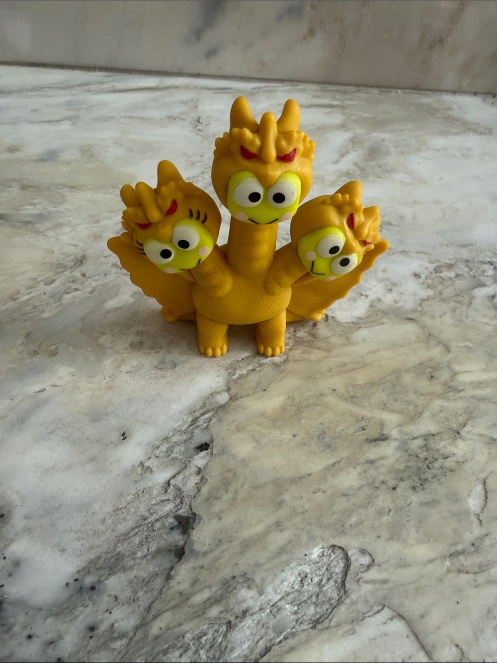 Hello Kitty Yellow Three-Headed Dragon Squeak Figure